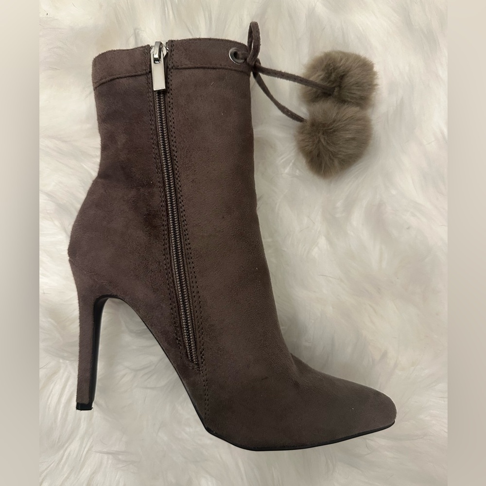 Call it spring Pom Pom boots, great condition.